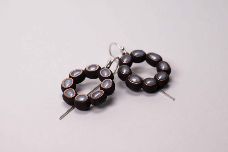 Ambroise Degenève, earrings : oxidized copper, gold, pearl Fossilized pearls