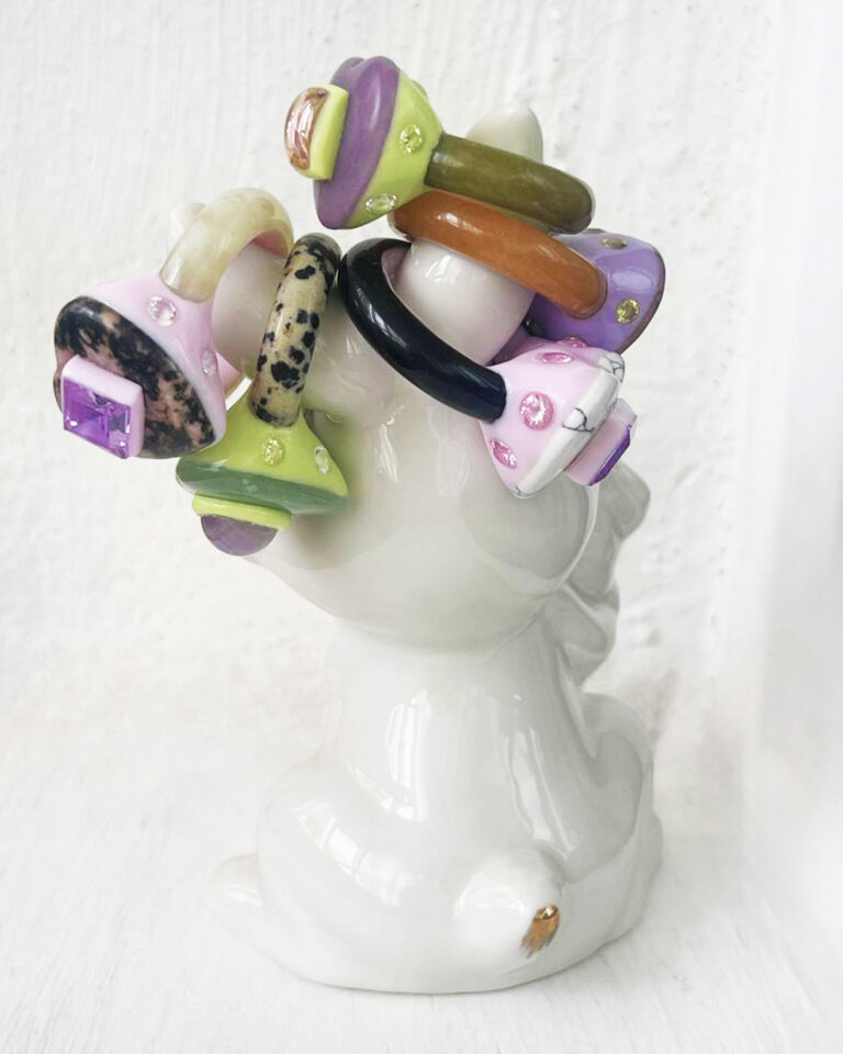 Anna Ariu multiple rings stone